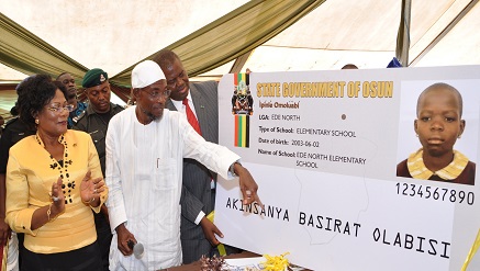 (L-r): Mrs. Titi Laoye-Tomori, deputy Governor, Ogbeni Rauf Aregbesola, governor, both of The State of Osun, and Demola Aladekomo, managing director, Chams Plc, during the launch of Students Biometric Card for all public schools in the State of Osun on Wednesday, August 6, 2014.